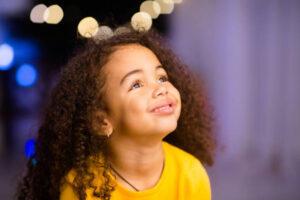 A young girl confidently managing her anxiety, symbolizing progress and emotional growth.
