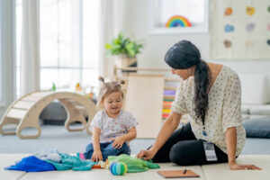 Child engaged in play therapy session with therapist in Alpharetta, GA
