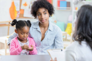 A therapist talking with a parent