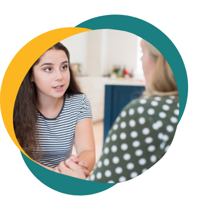 Photo of a teen girl talking with an older woman. Looking for support when it comes to managing your emotions as a teen? With teen counseling in Macon, GA you can begin managing your emotions in a healthy way with support from a teen therapist.