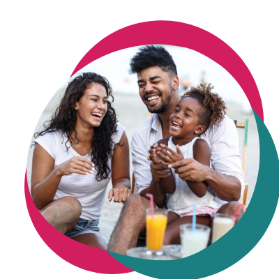 Photo of a happy family smiling and eating food. Struggling to connect with your family? Learn how family counseling in Macon, GA can help your family begin connecting on deeper levels.