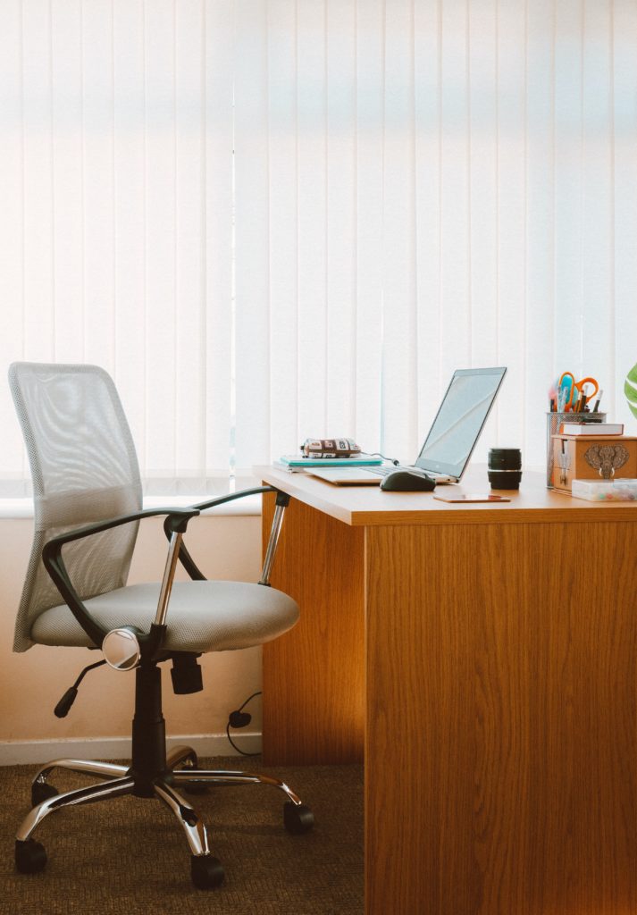 Photo of an office desk and chair. Looking for new ways to get support to manage your mental health needs? With online therapy in Georgia you can work with a skilled therapist to begin coping with your symptoms.